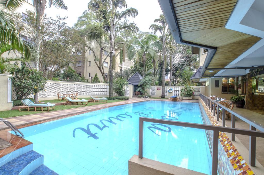 Mimosa Court Apartments Найроби Номер фото